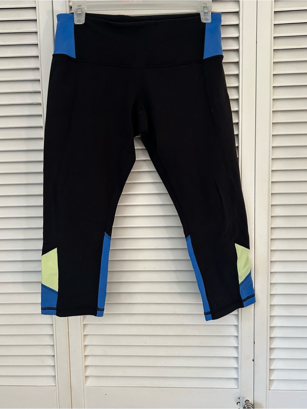 Reversible lululemon athletica Black Capri Leggings with Blue and Lime Panels